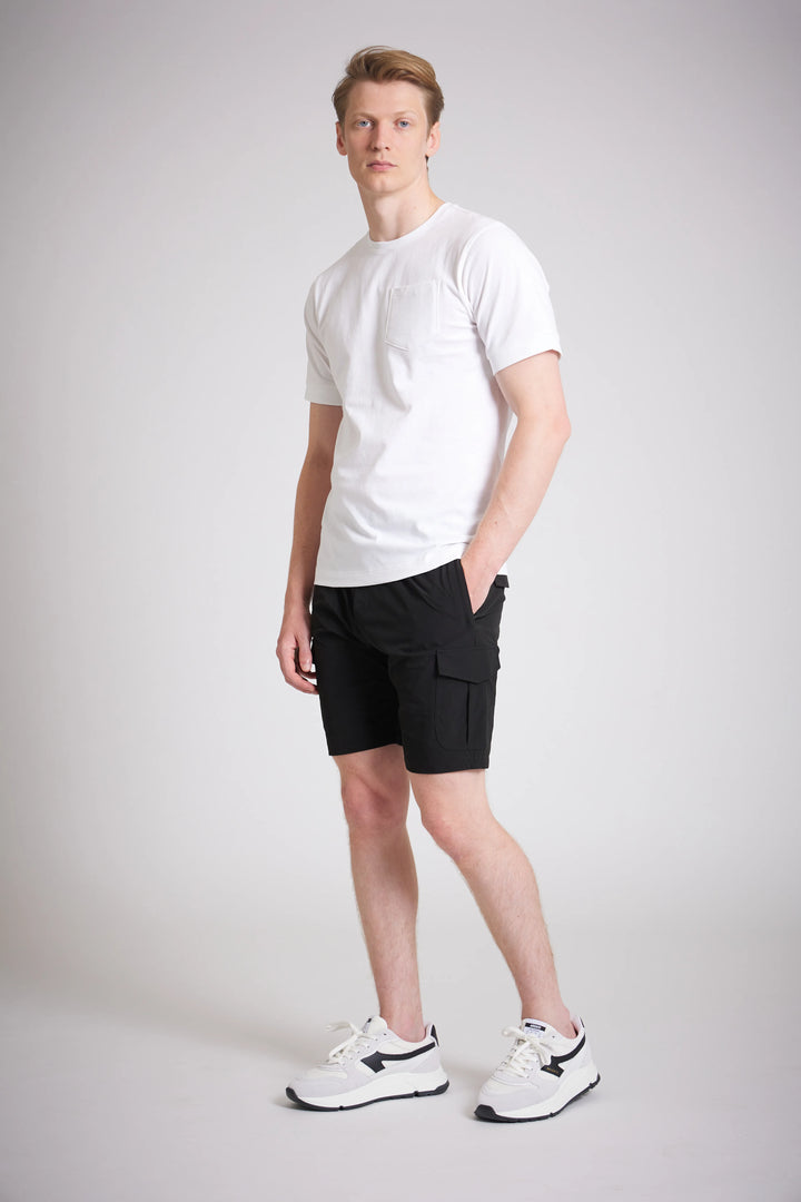Black cargo shorts men zip pocket detail close up
