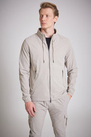 Cargo jacket mens stone drawstring hood close up
