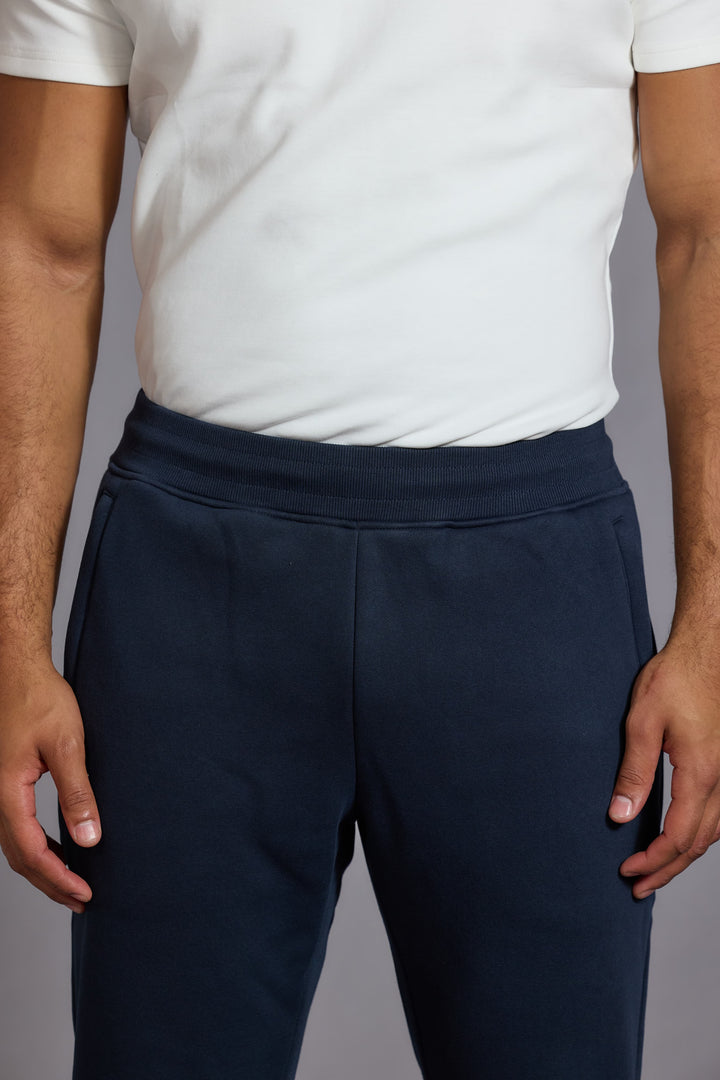 Cotton joggers men navy blue ribbed waistband close
