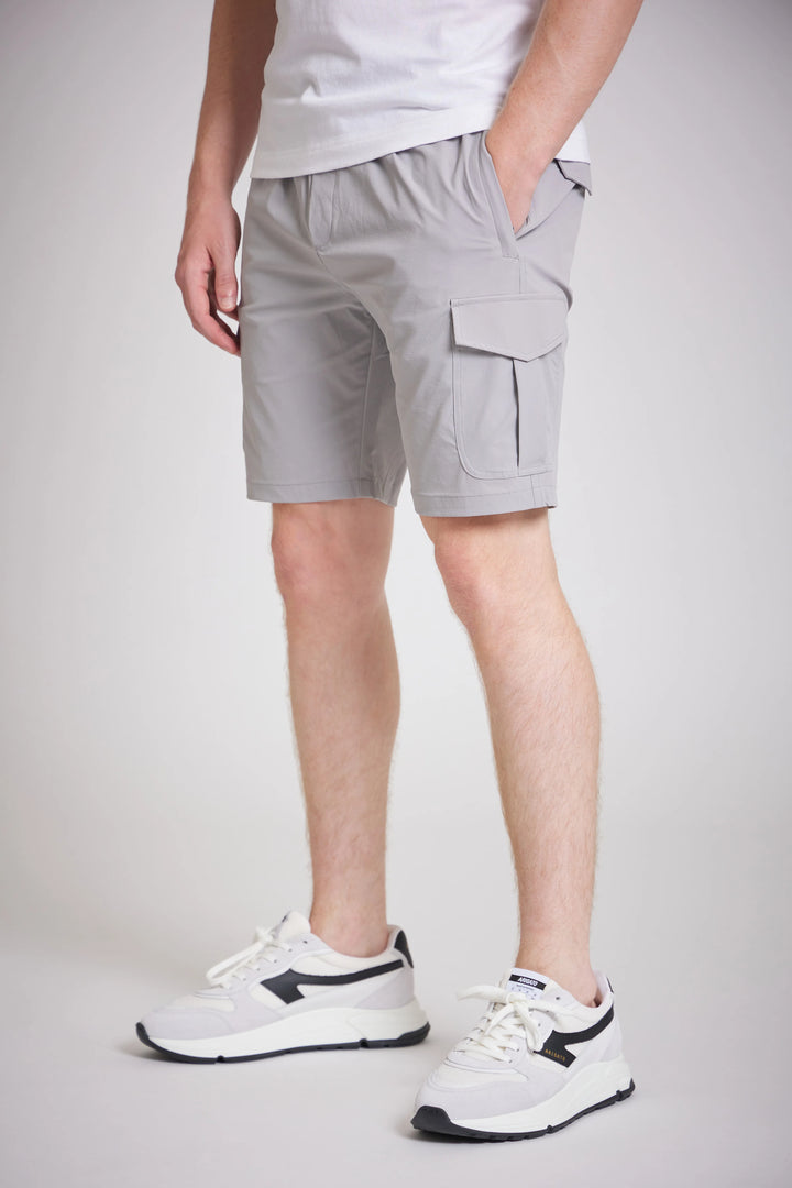 Grey cargo shorts men flap pocket detail close up
