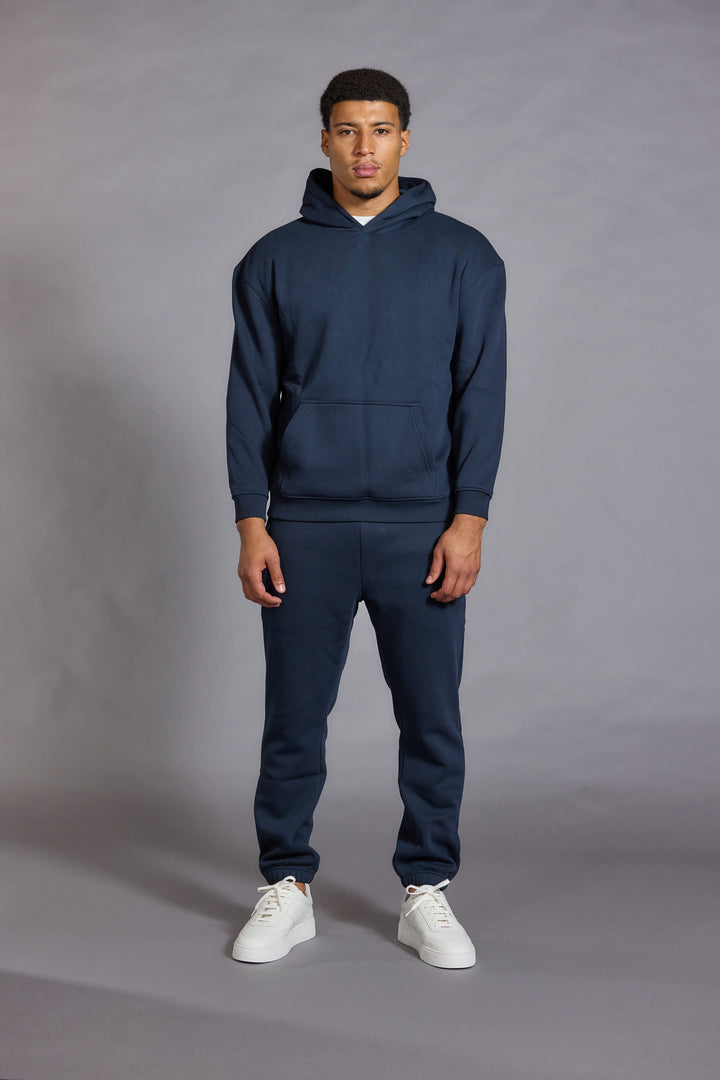 Mens navy hoodie relaxed fit dropped shoulders front view
