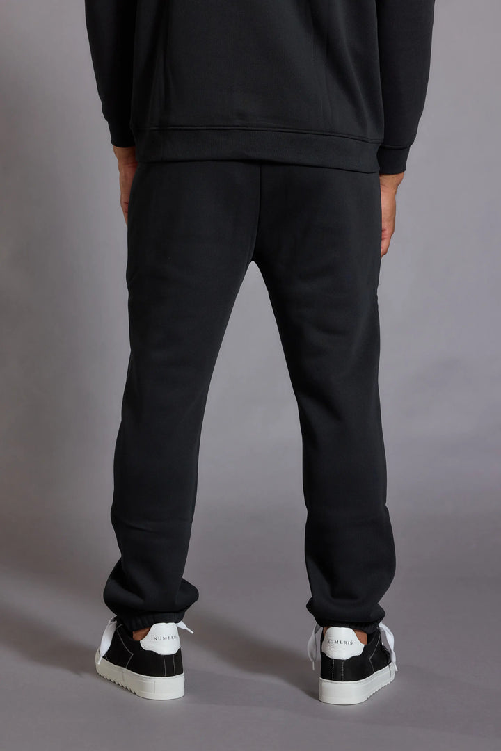 Mens relaxed joggers black jersey sweatpants front view
