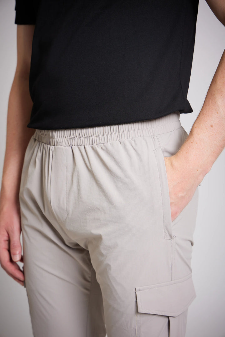 Men's trousers stone slim fit cream trainers outfit
