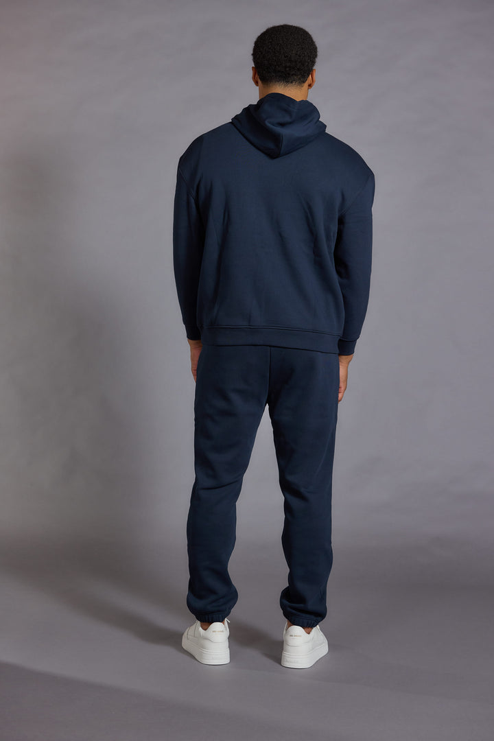 Navy joggers men cotton jersey side pocket detail
