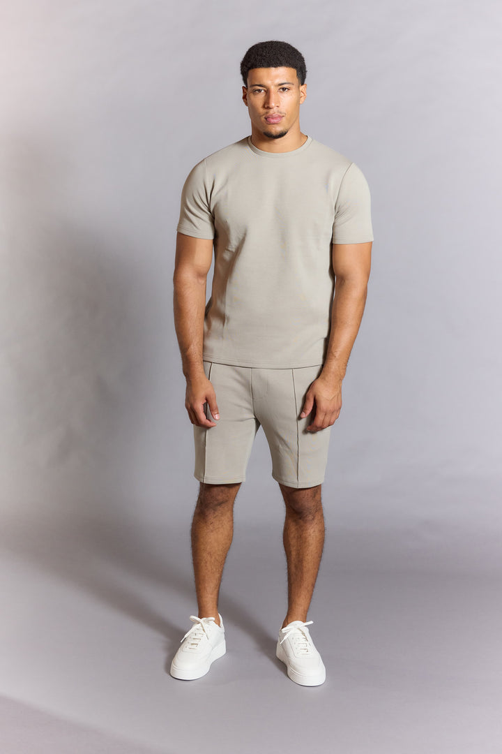 Stone shorts for men with clean modern silhouette
